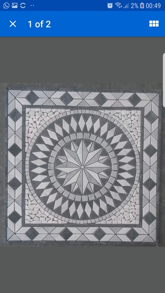 Mosaic medallion on porch room floor