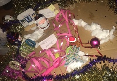 To decorate my neighbour’s new ‘no parking outside my door’ signs with a bit of tinsel?