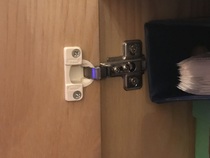 What can I do about these poorly fitted cupboard doors?