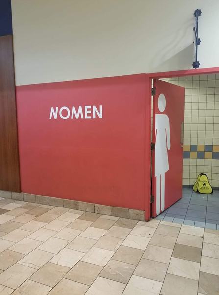 "Women" sign = transphobic <sigh>