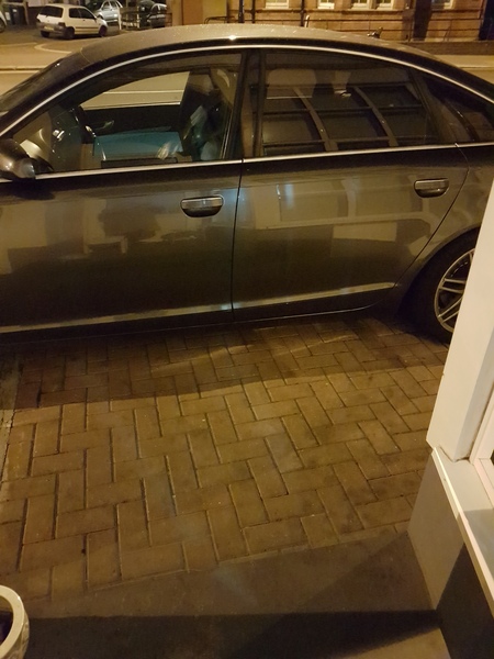 Upstairs neighbours blocking the porch with their car..