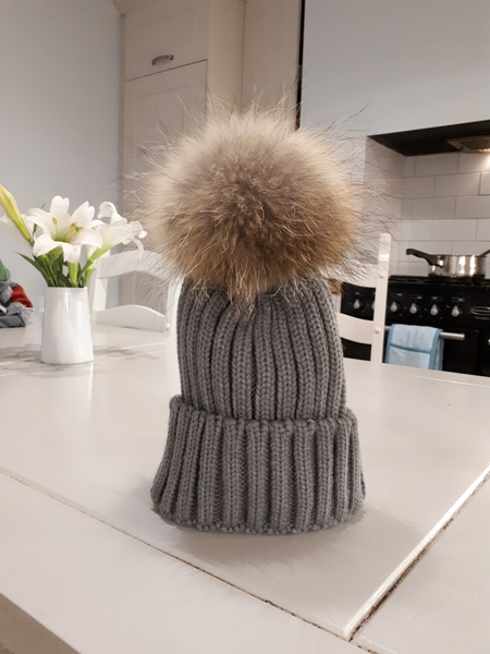 Bobble hats with faux fur pom poms - this JUST CAN'T be right....can it?!