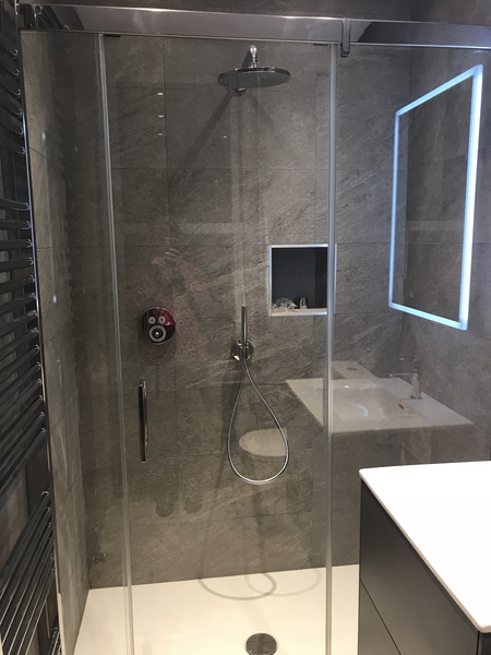 Shower enclosure or walk in behind a wall?