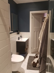 Shower enclosure or walk in behind a wall?