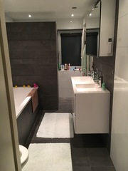 Shower enclosure or walk in behind a wall?