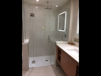 Shower enclosure or walk in behind a wall?
