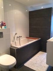 Shower enclosure or walk in behind a wall?
