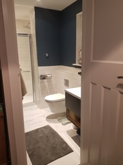 Shower enclosure or walk in behind a wall?