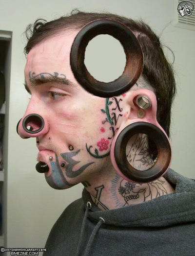 To dislike flesh tunnels aka gaping cats' arseholes