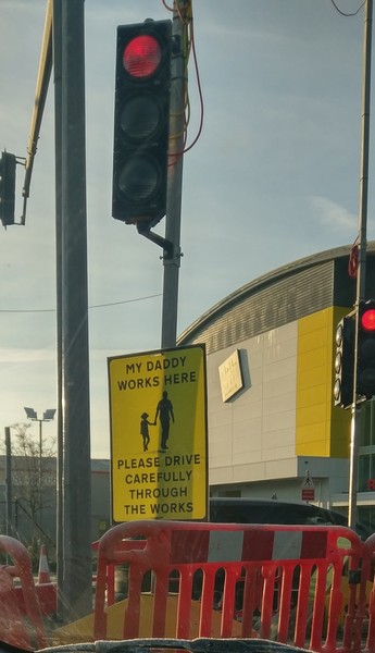 Posters at roundabout.
