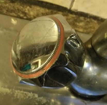 Anyone got any ideas as to how to take the cover off this tap???