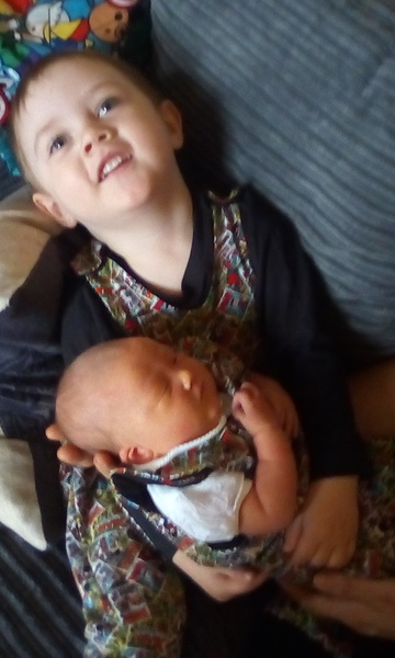 To dress young daughters the same