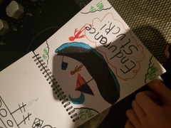 What do i do about this drawing from 7yo son?