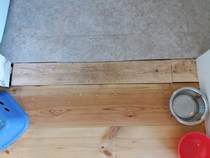 Dispute with flooring people re:sanding job, AIBU? Pics attached.