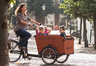 AIBU to ask if bicycle towing a child carrier looks unbelievably unsafe?