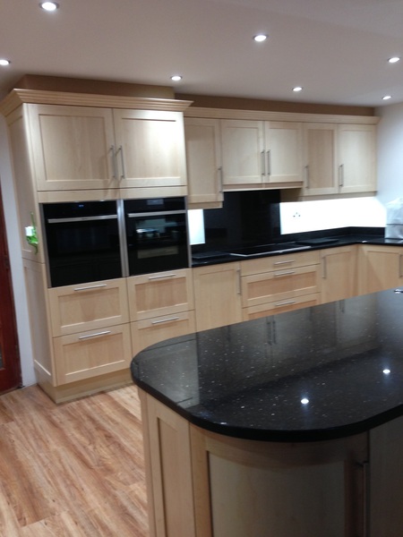 Light oak kitchen units with distressed oak vinyl floor..too much wood?