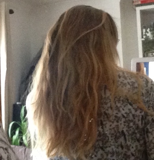 Wavy mid/shoulder length layered hair cut