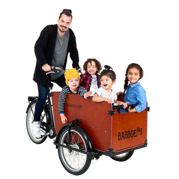AIBU to ask if bicycle towing a child carrier looks unbelievably unsafe?