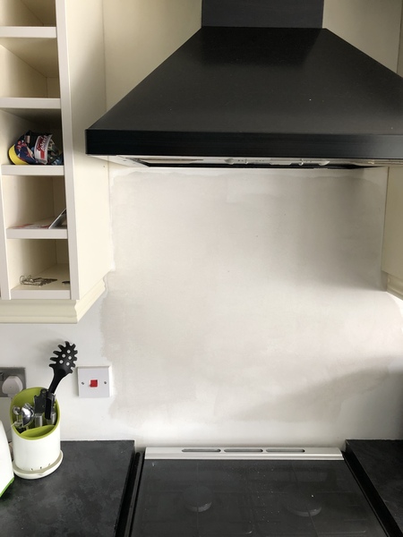 Cream units, black worktop ... Ammonite ?