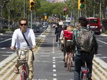 AIBU to ask if bicycle towing a child carrier looks unbelievably unsafe?