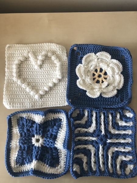 Woolly Hugs. We are making a blanket for lovely AndNoneForGretchenWieners, her wonderful DH has died.