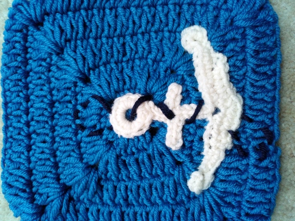 Woolly Hugs. We are making a blanket for lovely AndNoneForGretchenWieners, her wonderful DH has died.
