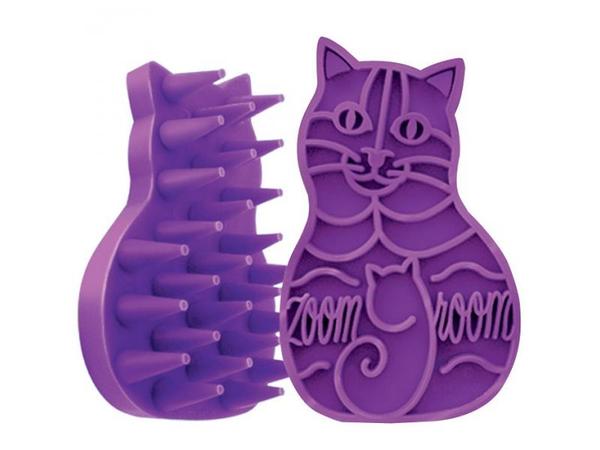 What do you brush your cat with?