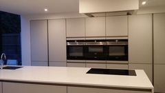 Kitchen island with hob and sink