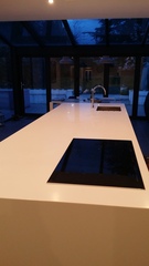 Kitchen island with hob and sink