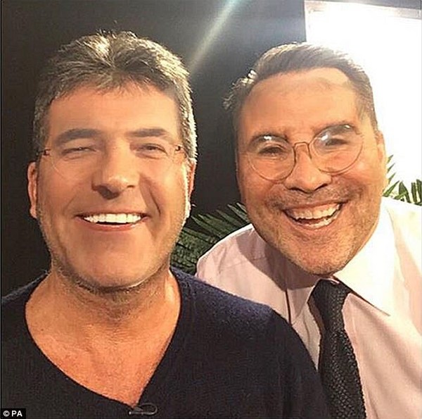 WTF has Simon Cowell done to his face?!