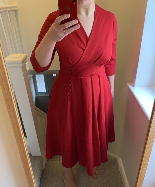 Elegant but flattering dress for a wedding guest?