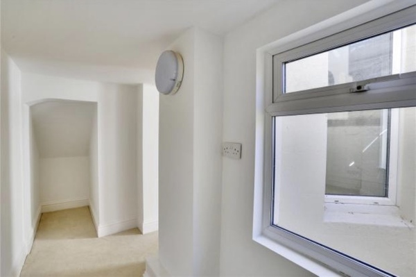 How hard/expensive would it be to turn this space into a utility room?