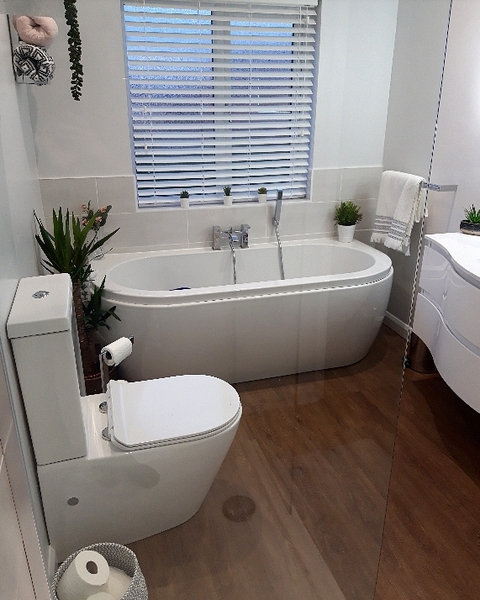 To ask you to look at this pic of my new bathroom and tell me why I hate it!