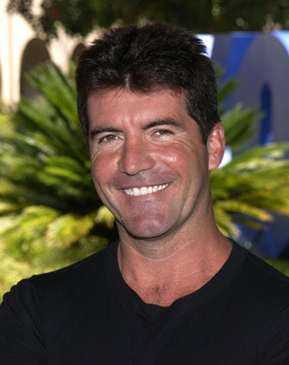 WTF has Simon Cowell done to his face?!