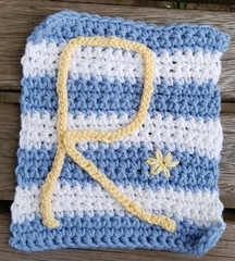 Woolly Hugs. We are making a blanket for lovely AndNoneForGretchenWieners, her wonderful DH has died.