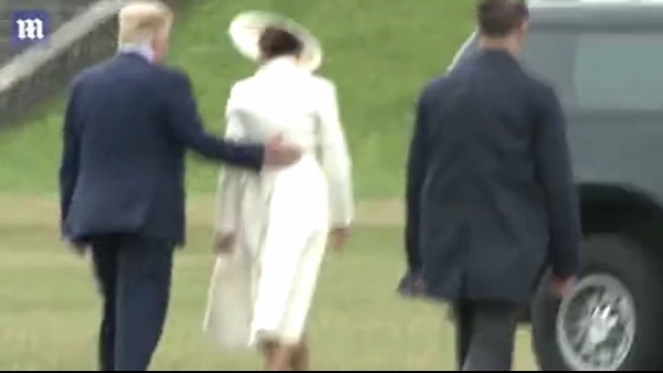 You'd think Trump or someone would offer Melania a hand here...