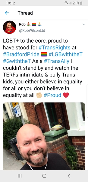 Lesbians on chairs AGAIN, this time drinking coffee