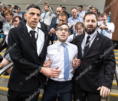 Man-handling climate change protestors