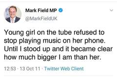 MP Mark Field grabs female protester by throat