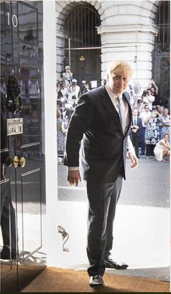 Can't help but admire the perfect glosswork of the No.10  front door as Boris poses
