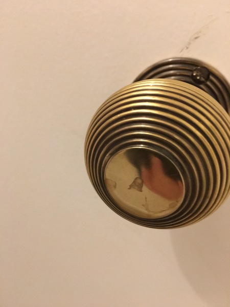 How to get stain off brass doorknob