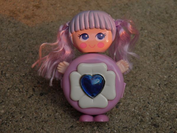 Like Polly Pocket but a dolly/little person