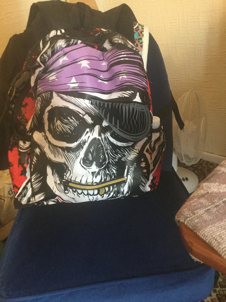 To feel awkward wearing a backpack as a grown woman?