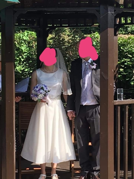 Did you have a tea length wedding dress?...