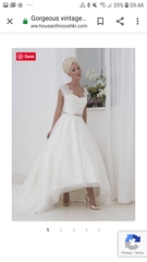 Did you have a tea length wedding dress?...