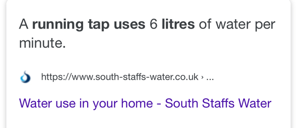 WIBU- washing dishes under running hot tap