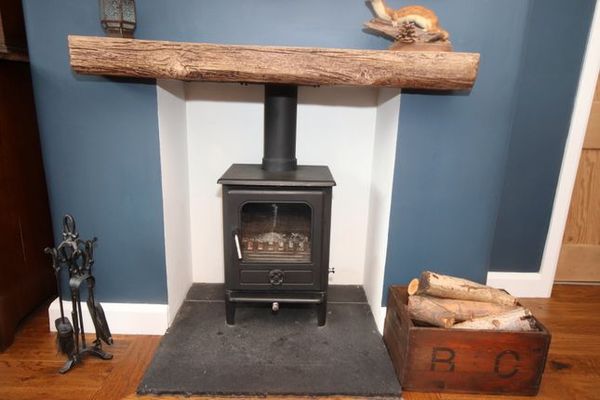 Anyone got a concrete 'wooden' beam above their fireplace? (inglebeam)