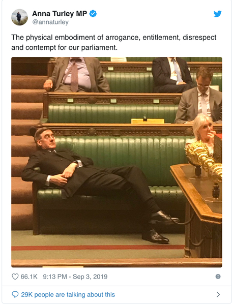 Jacob ReesMogg lounging across 3 seats in the houses of Parliament, when brexit is being discussed