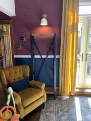 What colour walls with Navy and Copper/orange living room?