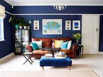 What colour walls with Navy and Copper/orange living room?